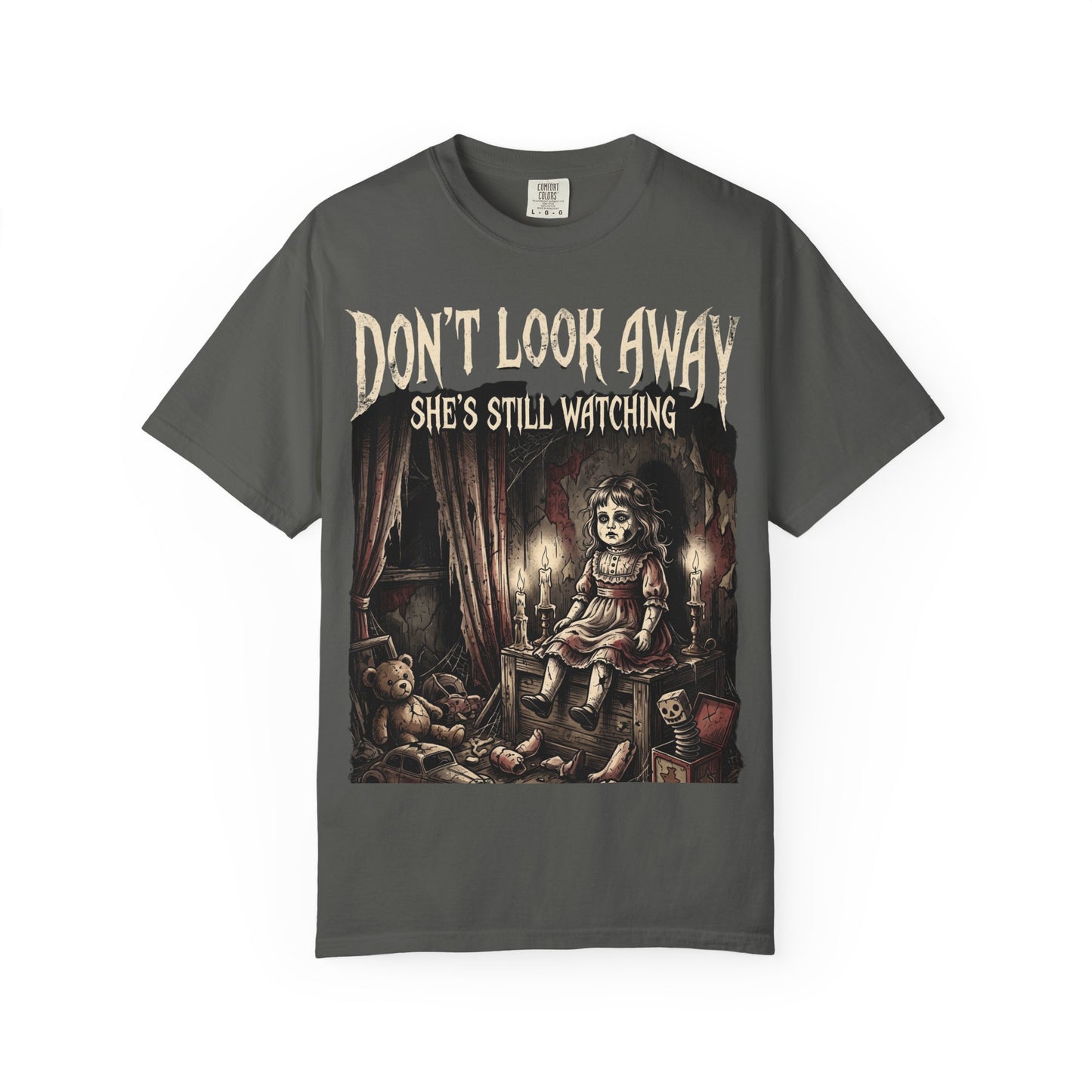 Horror Tee — "Don't Look Away, She's Still Watching" Creepy Doll Graphic T-Shirt