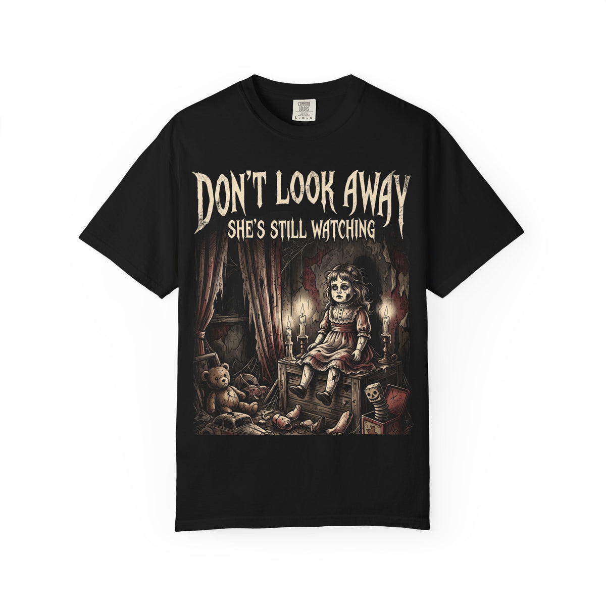 Horror Tee — "Don't Look Away, She's Still Watching" Creepy Doll Graphic T-Shirt